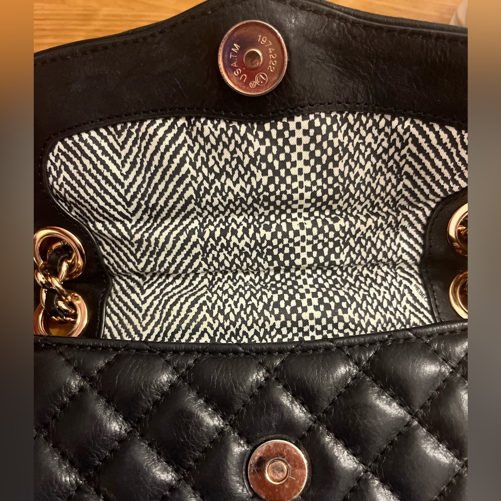 Rebecca Minkoff-Mini Quilted Black W/
Studded Rose Gold- UsedExcellent Condition - Picture 2 of 5